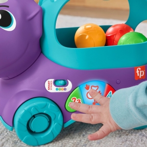 Fisher price hraj�c� dino s vyskakuj�c�mi m��ky